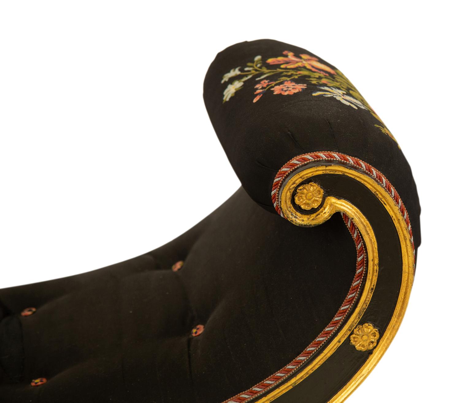 A Regency Ebonized and Parcel Gilt Curule Form Bench