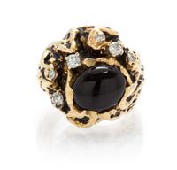 A 14 Karat Yellow Gold, Diamond and Onyx Ring, 11.30 dwts.
