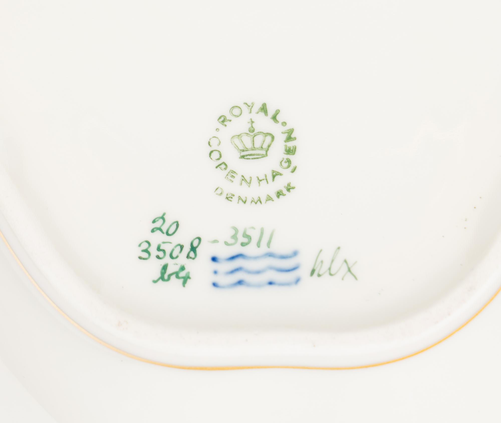 A Pair of Royal Copenhagen Flora Danica Porcelain Triangular Compotes and a Triangular Salad Bowl