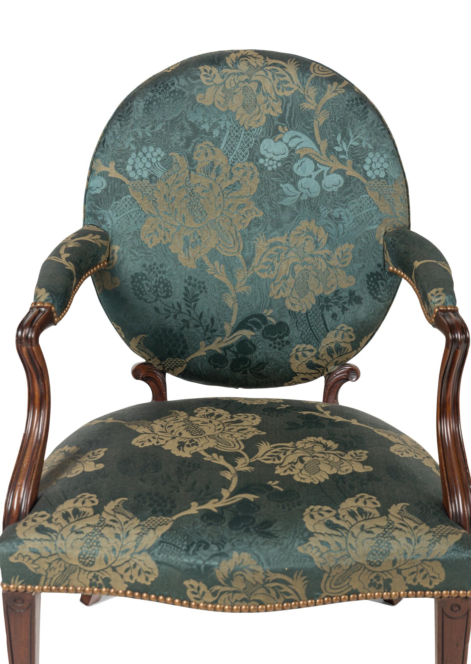 A Pair of George III Mahogany Armchairs