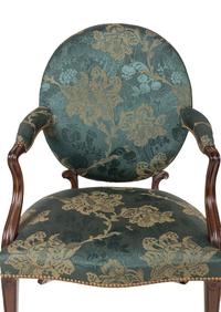 A Pair of George III Mahogany Armchairs