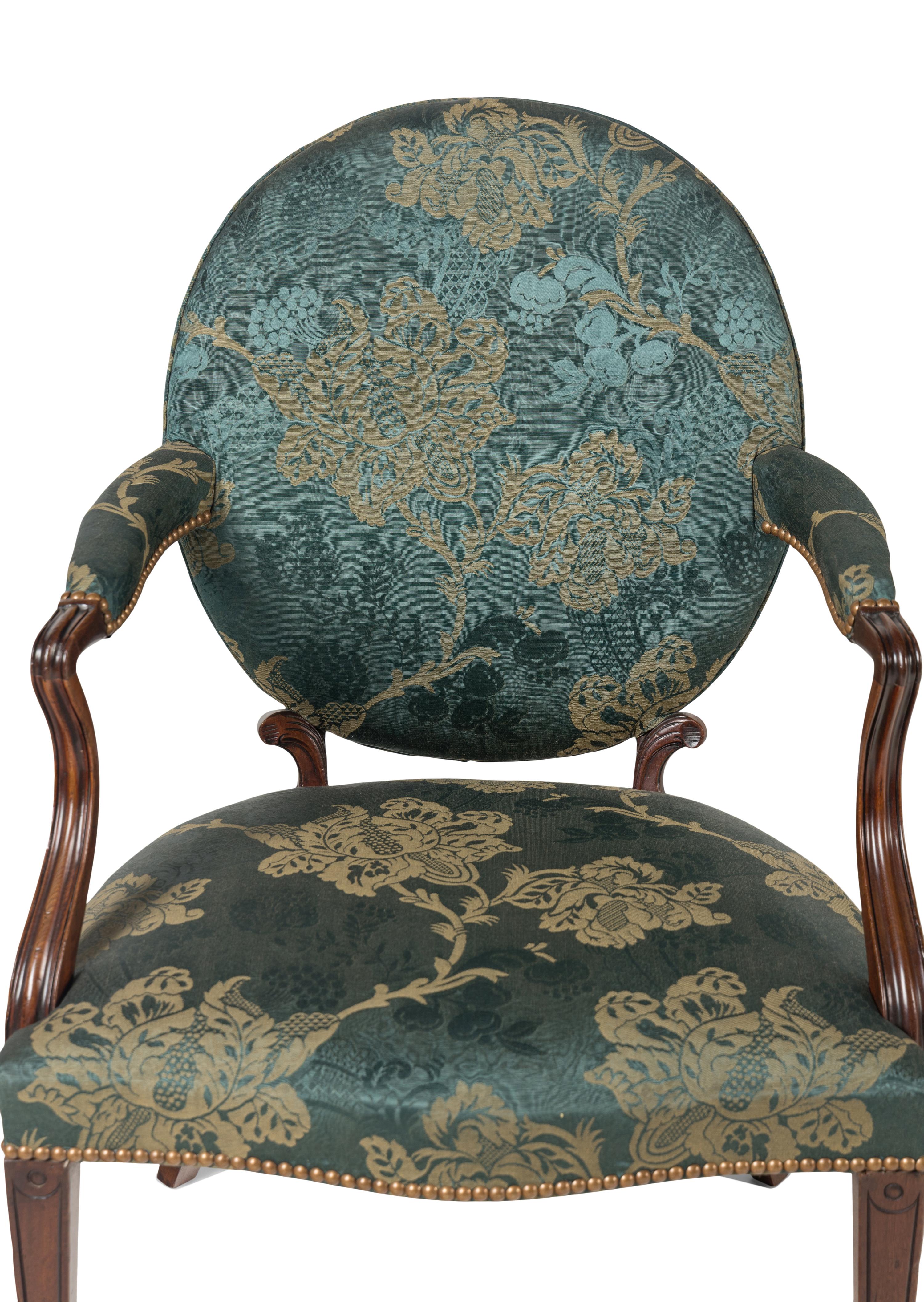 A Pair of George III Mahogany Armchairs