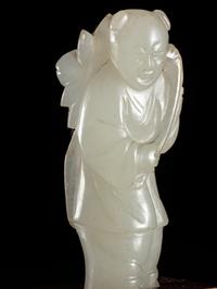 Two Carved Pale Celadon Jade Figures