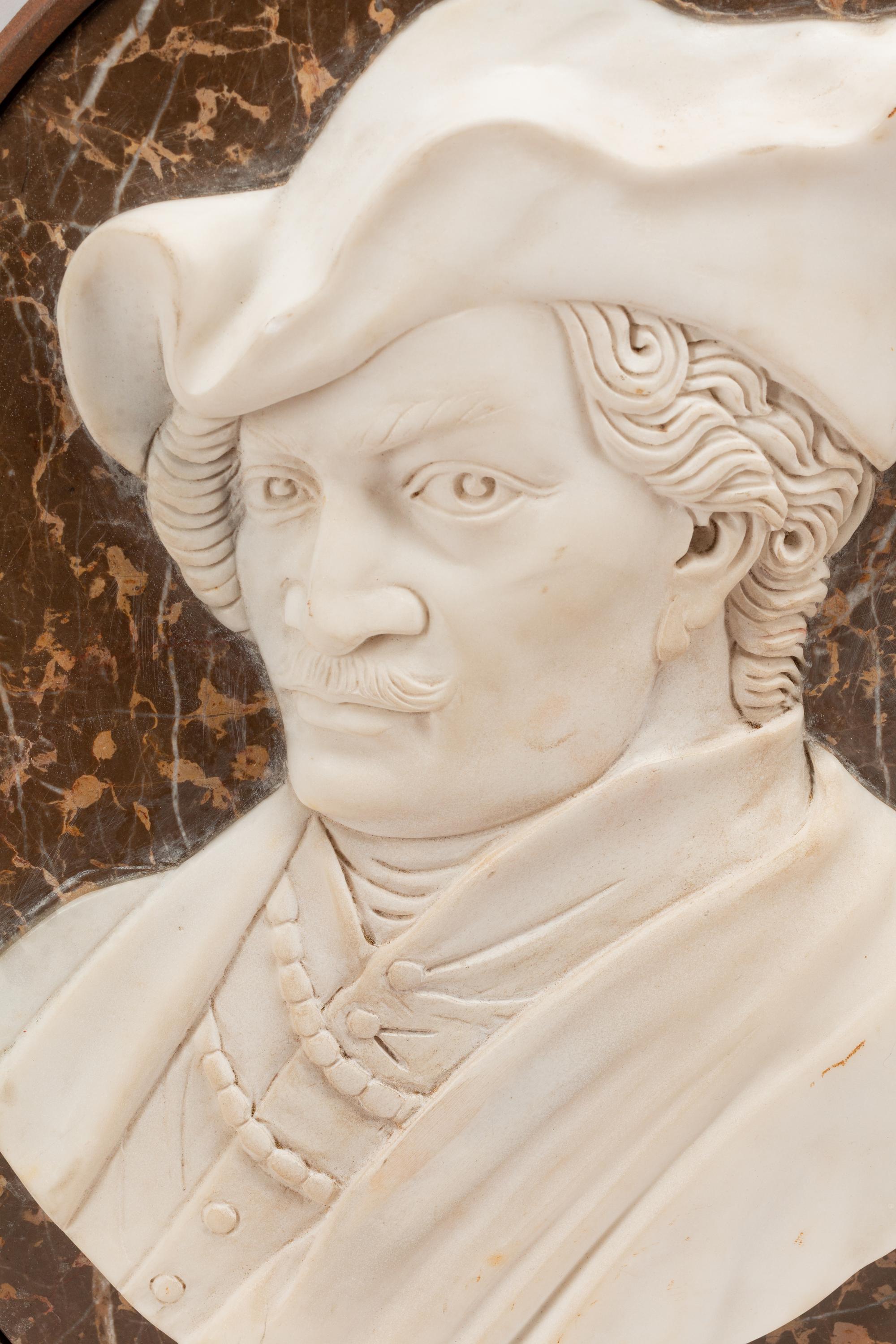 A Set of Four Iron-Framed Carved Marble Portrait Plaques of English Figures