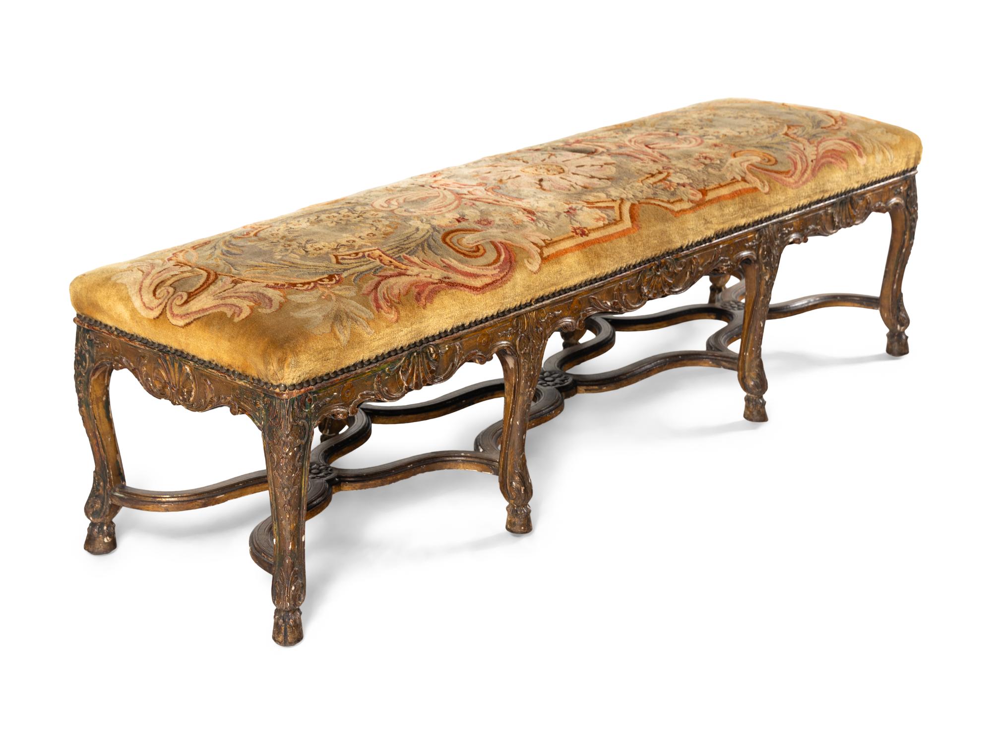 A Louis XV Style Polychrome Painted Giltwood Bench