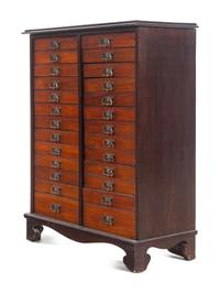 A Mahogany Collector's Cabinet