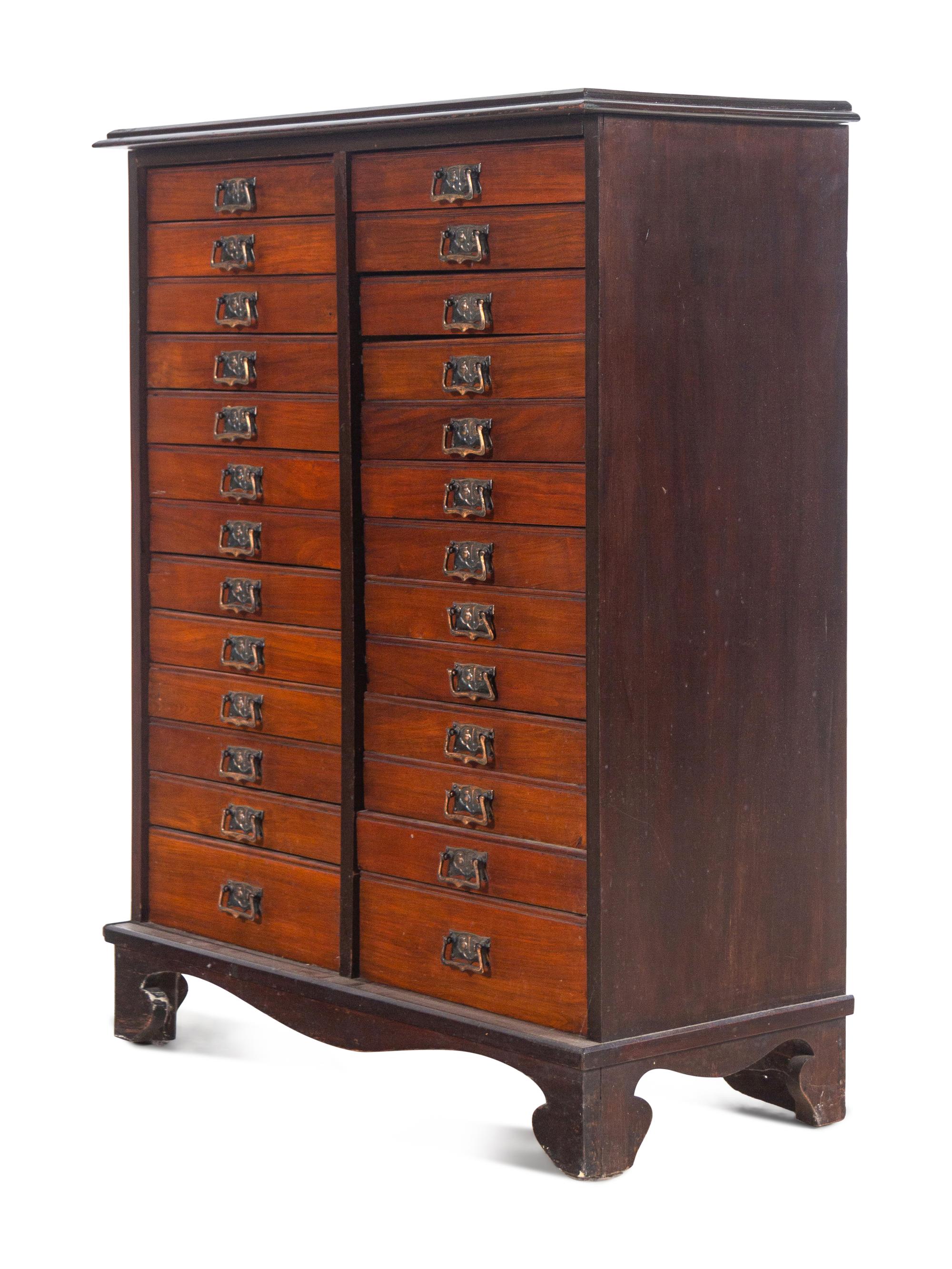 A Mahogany Collector's Cabinet
