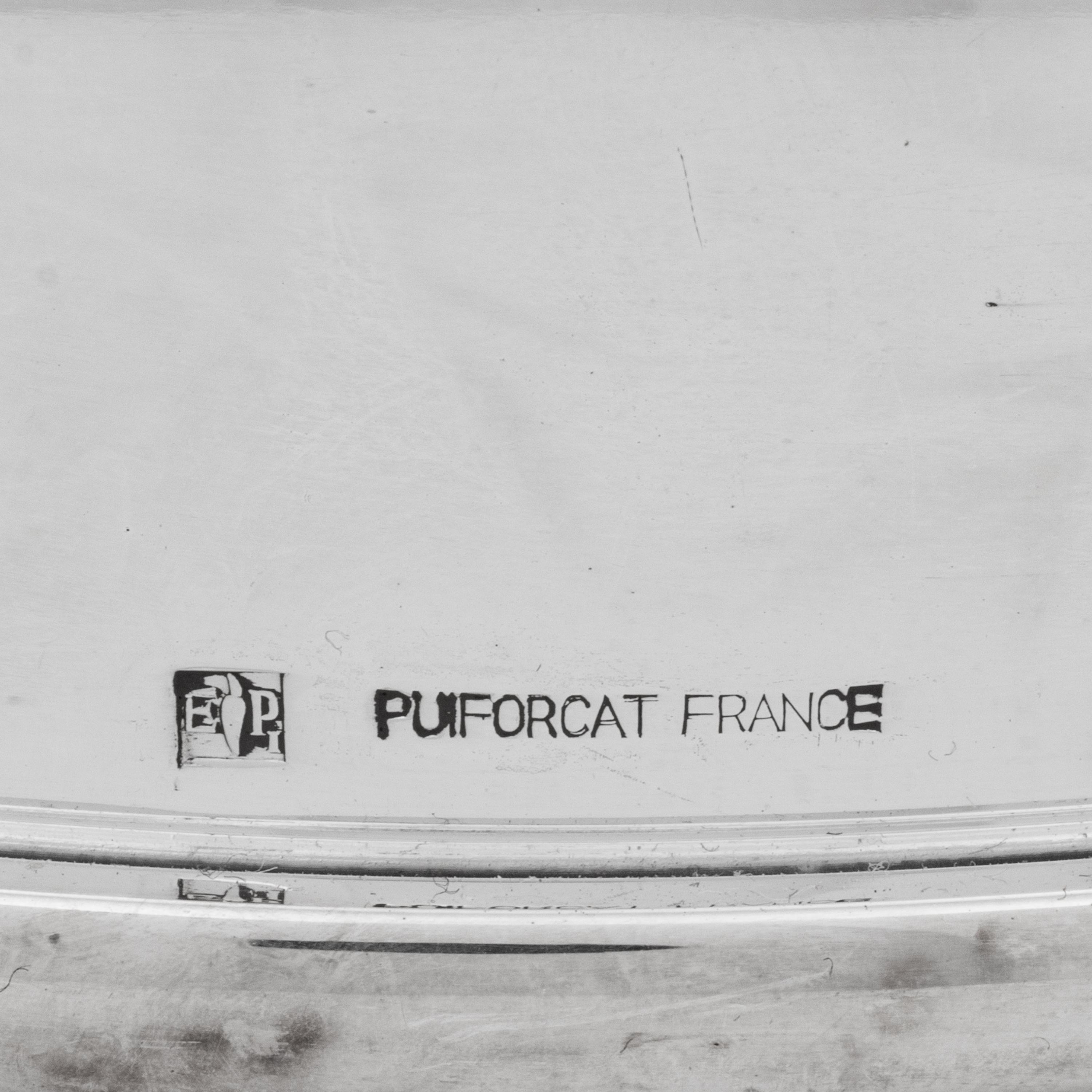 A Set of Six Puiforcat Silver-Plate Cloches