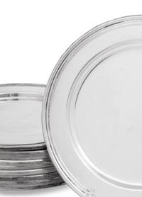 A Set of Eleven Cartier Silver Bread Plates