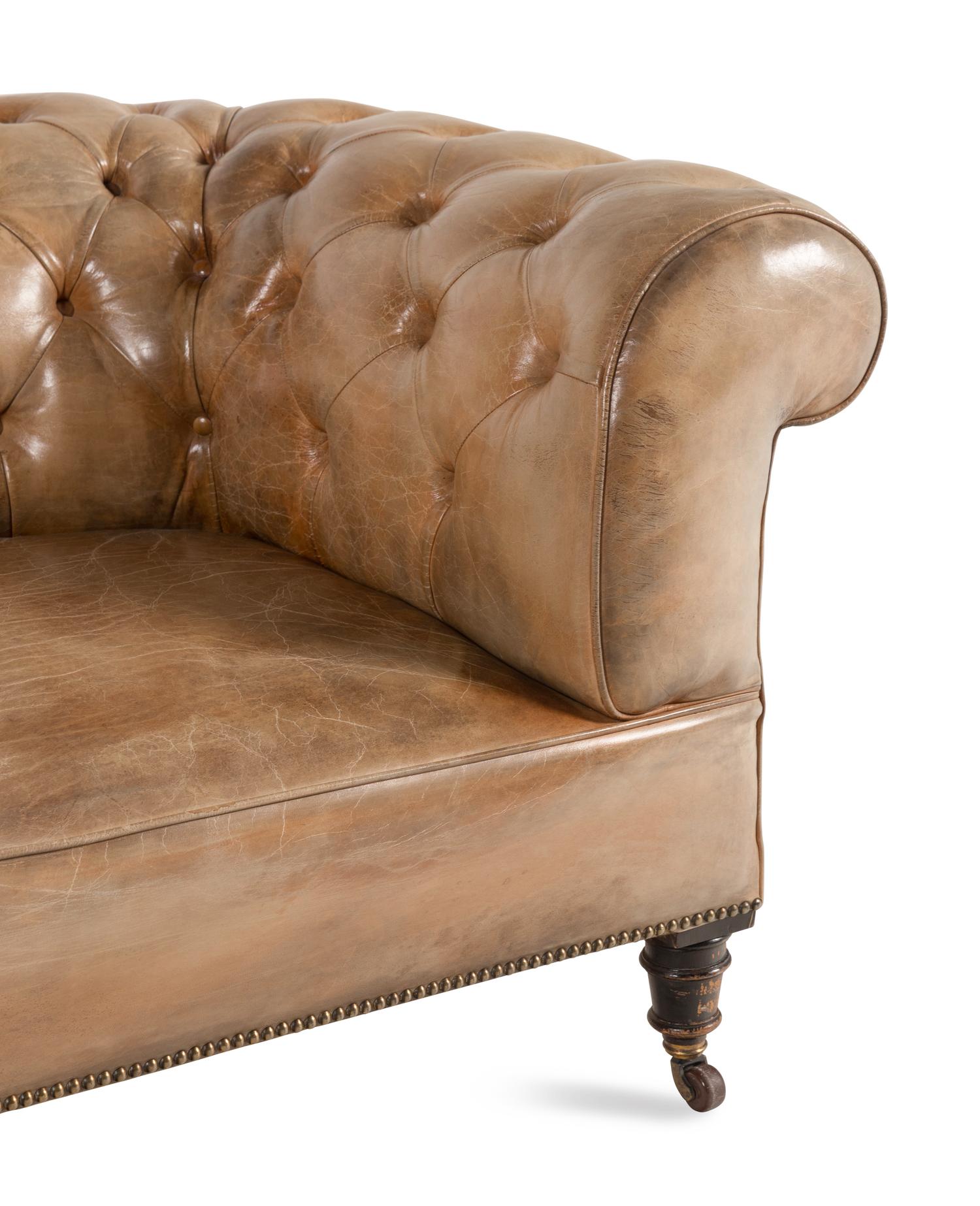 A Leather Upholstered Chesterfield Sofa