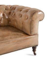 A Leather Upholstered Chesterfield Sofa