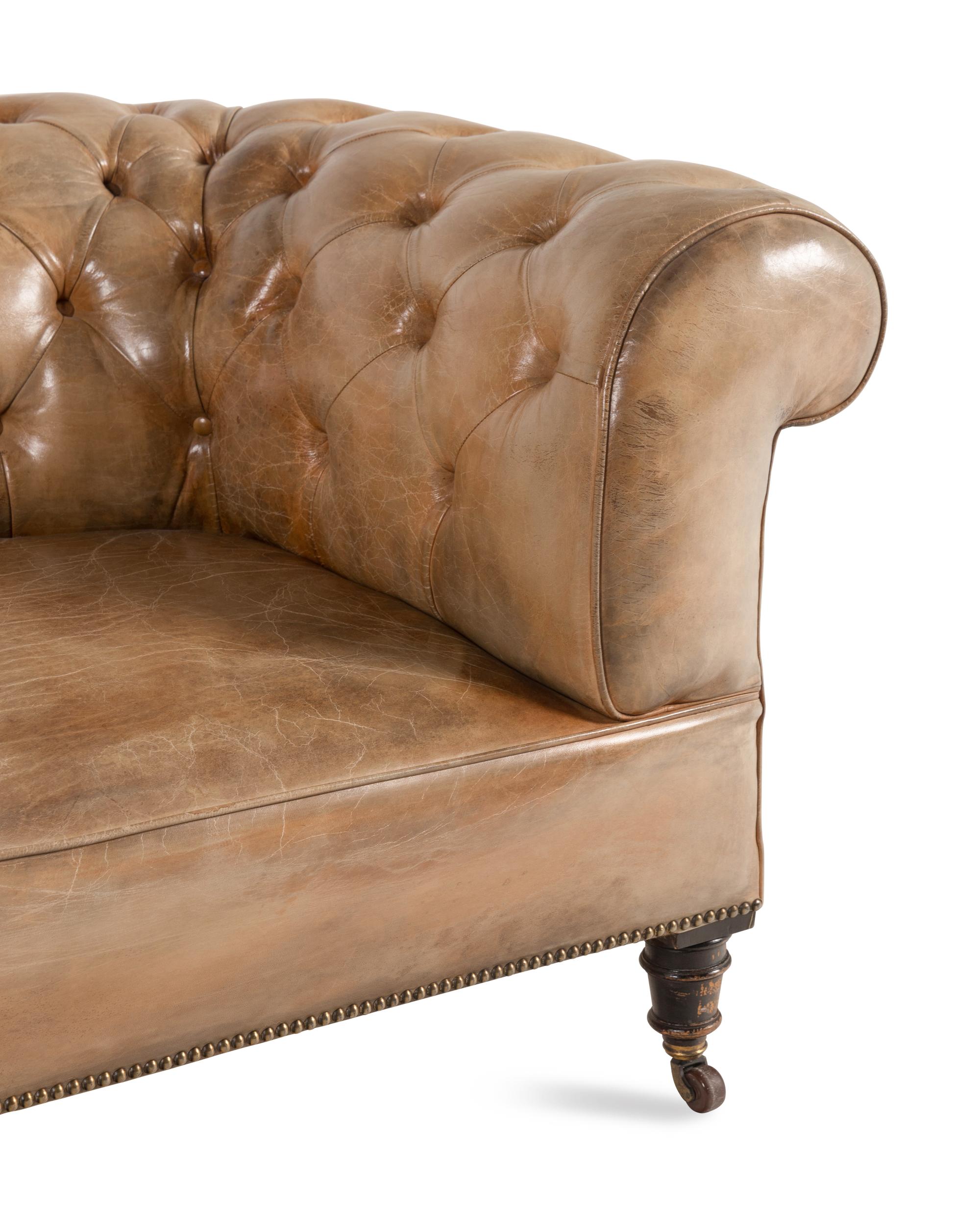 A Leather Upholstered Chesterfield Sofa