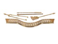 A Pair of Brass Andirons