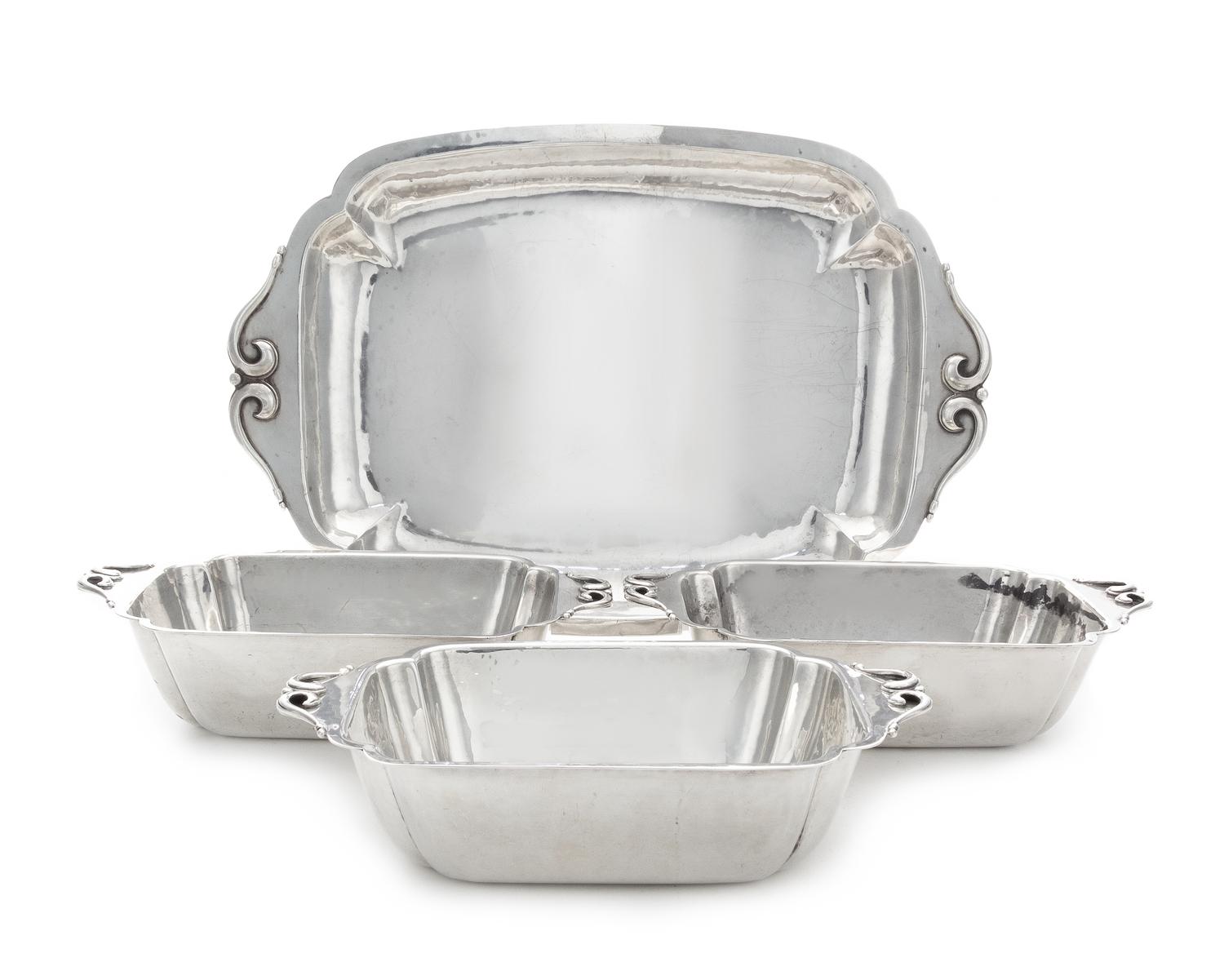 A Set of Three American Silver Vegetable Dishes and Matching Tray, Cellini Craft, Ltd., Chicago, IL, 1940, each of shaped rectangular f