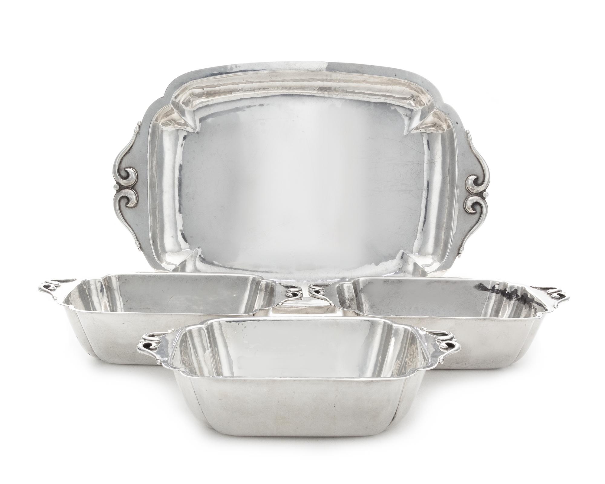 A Set of Three American Silver Vegetable Dishes and Matching Tray, Cellini Craft, Ltd., Chicago, IL, 1940, each of shaped rectangular f