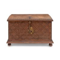 A Spanish Carved Walnut and Gilt Iron Chest