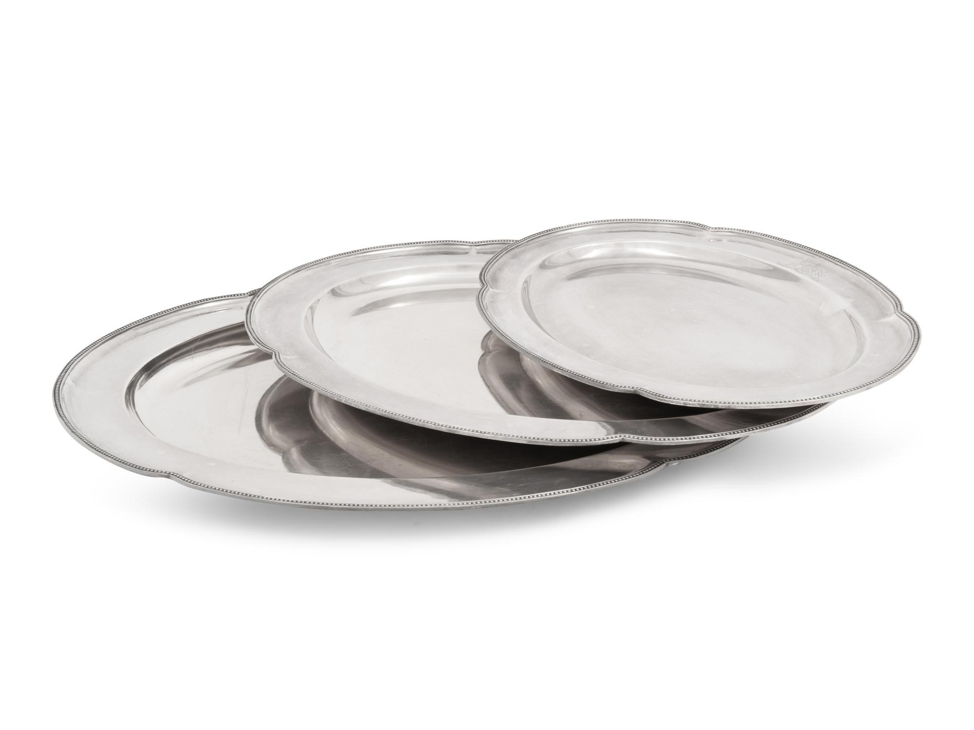A Set of Three Graduated English Silver-Plate Trays with Engraved Coats of Arms