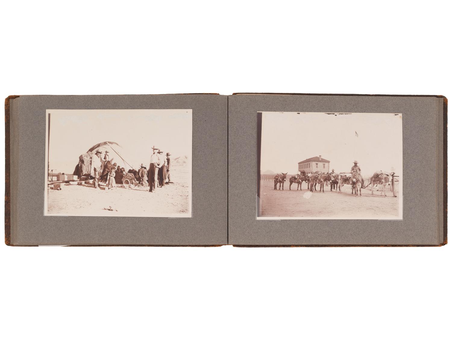 [NATIVE AMERICANS]. JONES, John Edward (1863-1922), photographer. Album containing 50 photographs of the San Carlos Indian Agency, including Apache civilians and police, agency buildings and dwellings, and scenic views. Ca 1904.