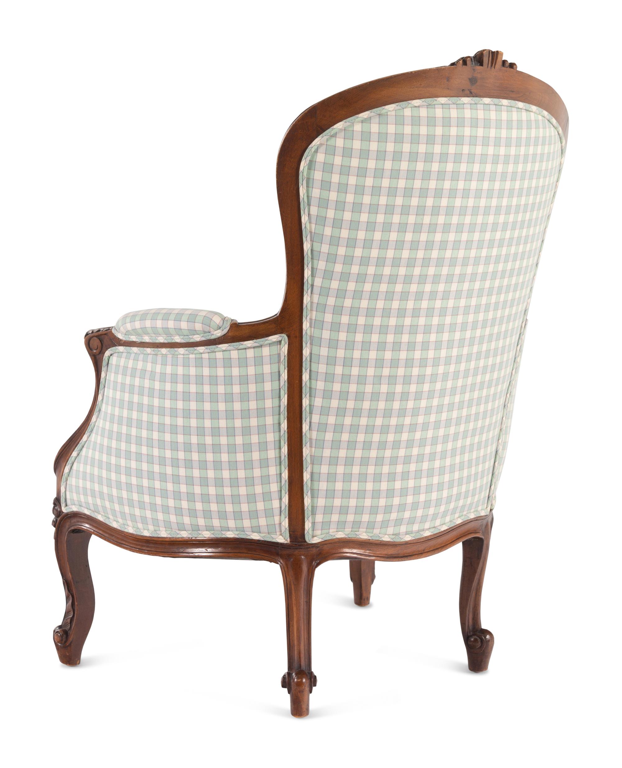 A Louis XV Style Walnut Bergère en Cabriolet
