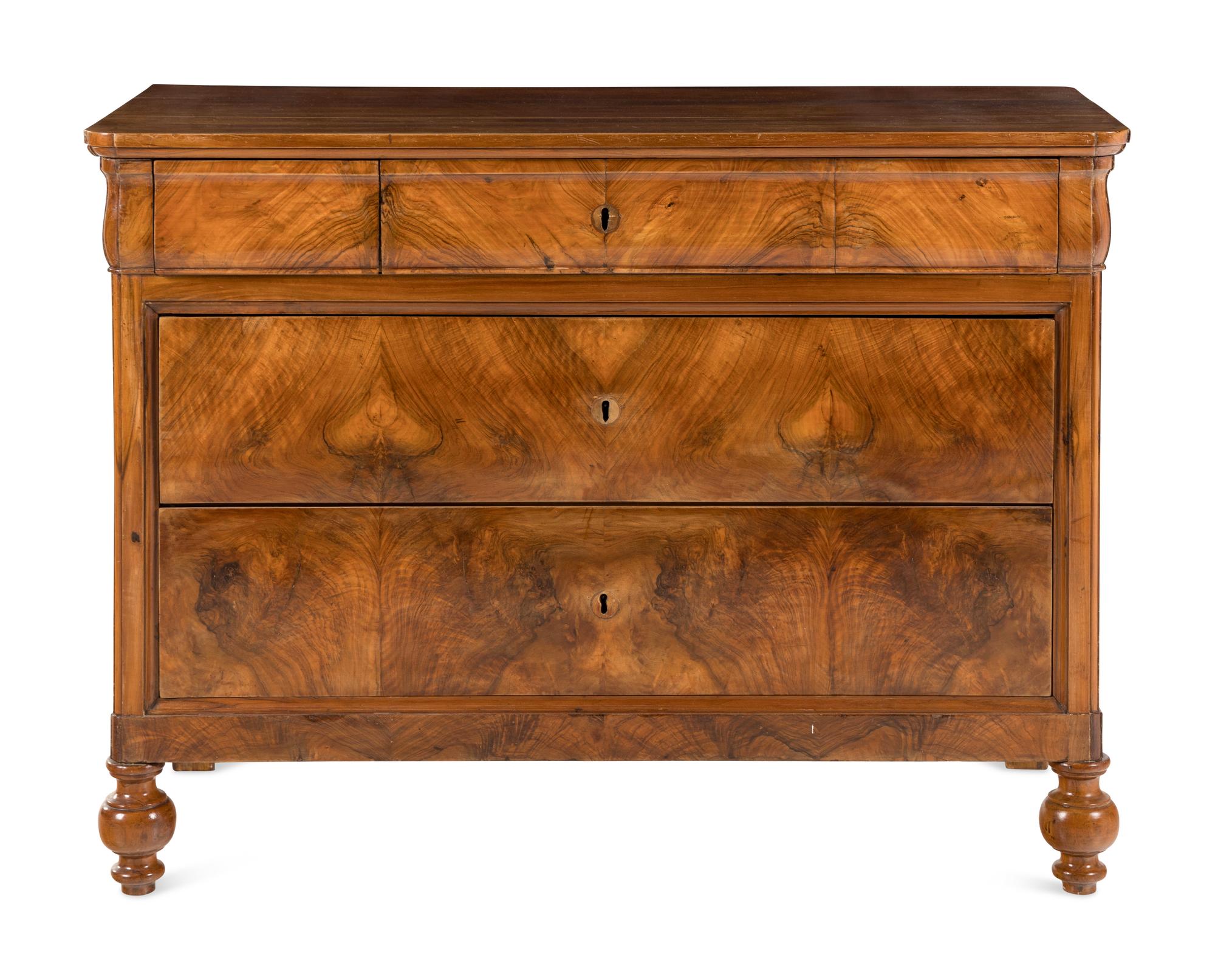 An Italian Walnut Chest of Drawers