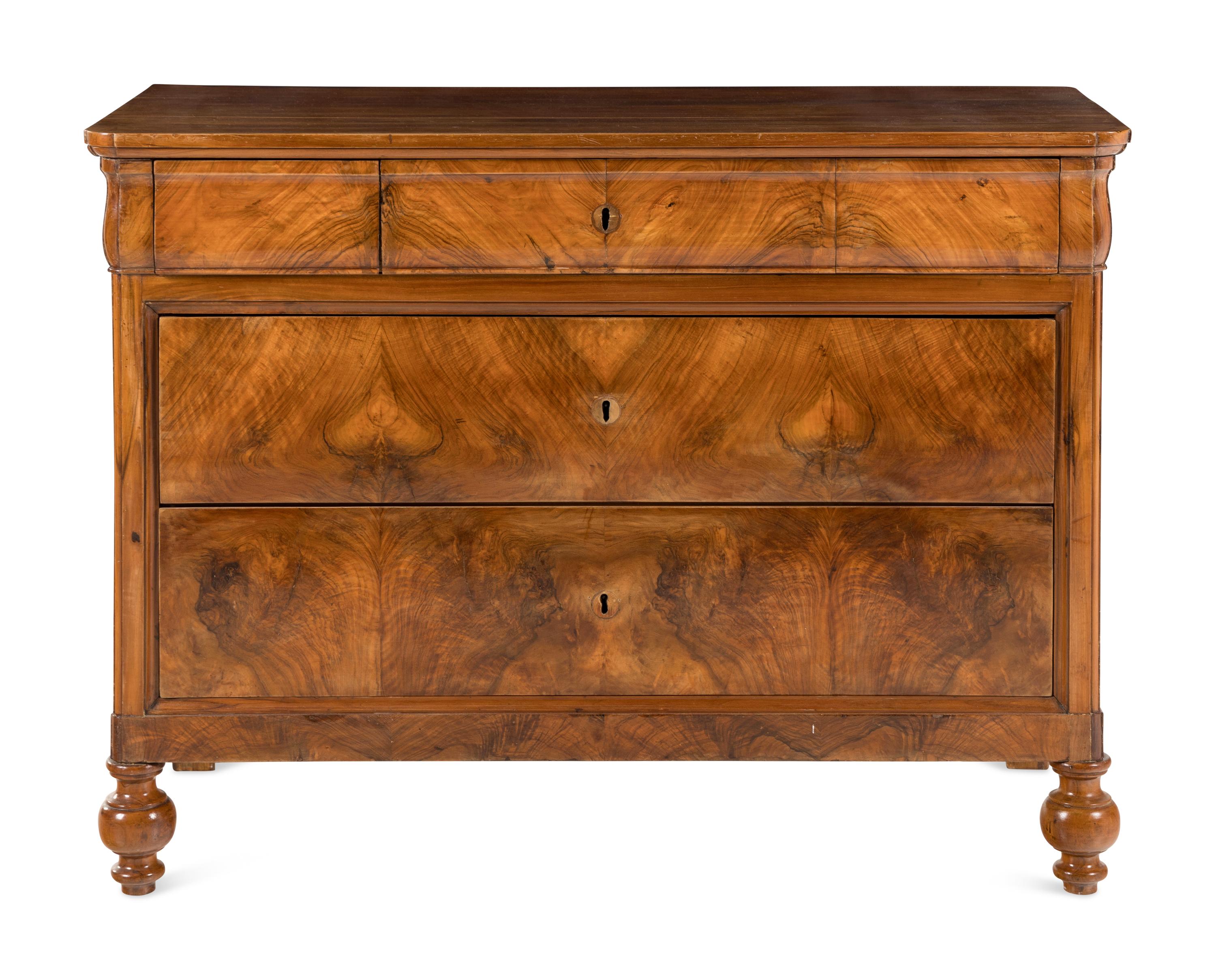 An Italian Walnut Chest of Drawers