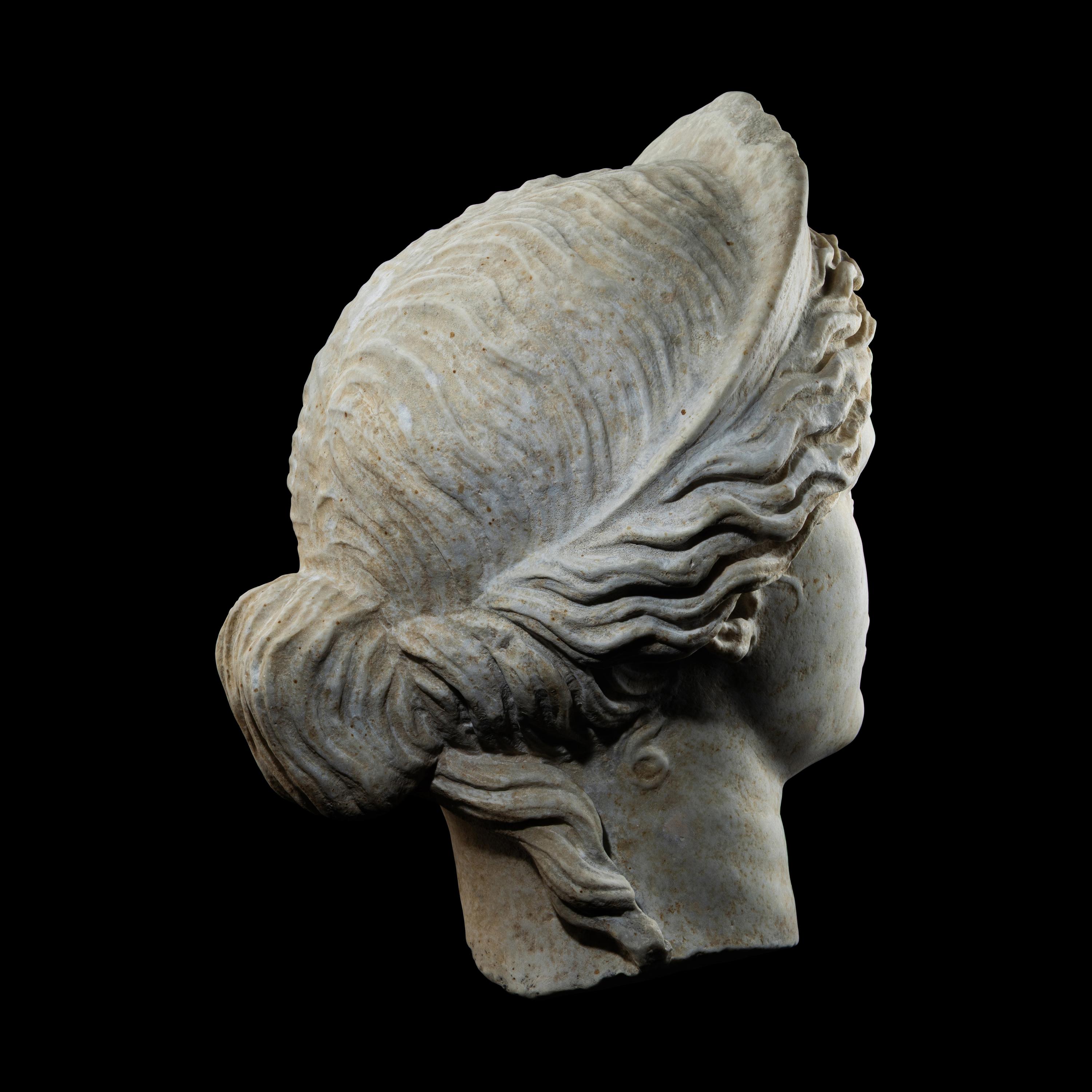 A Roman Marble Head of a Goddess