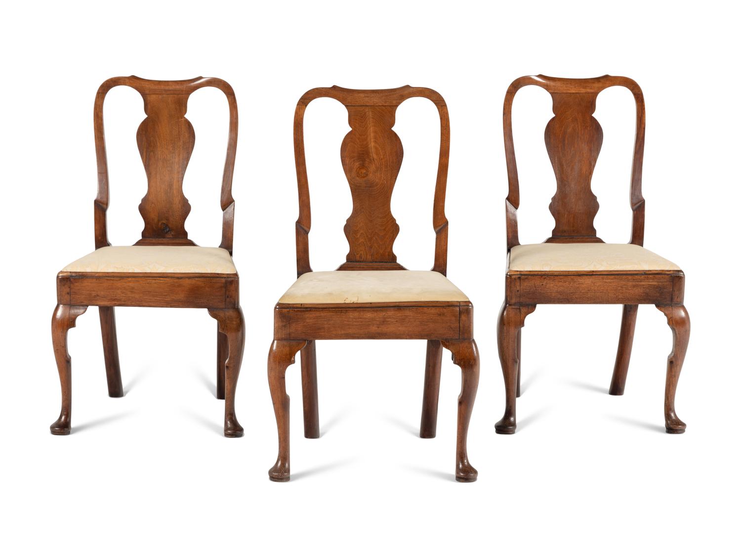 A Set of Three Queen Anne Walnut Side Chairs