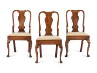 A Set of Three Queen Anne Walnut Side Chairs