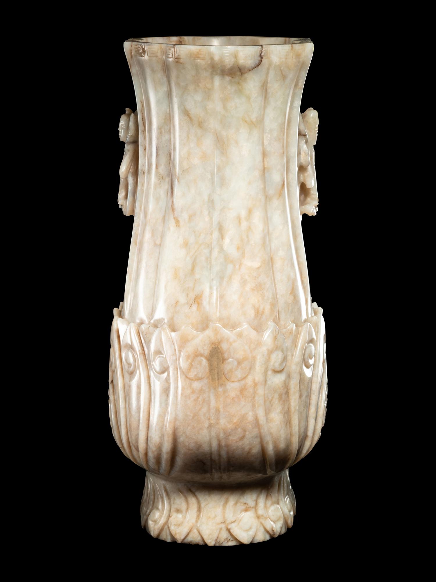A Chicken Bone Jade 'Lotus' Vase