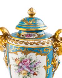 A Pair of Sèvres Style Porcelain Urns