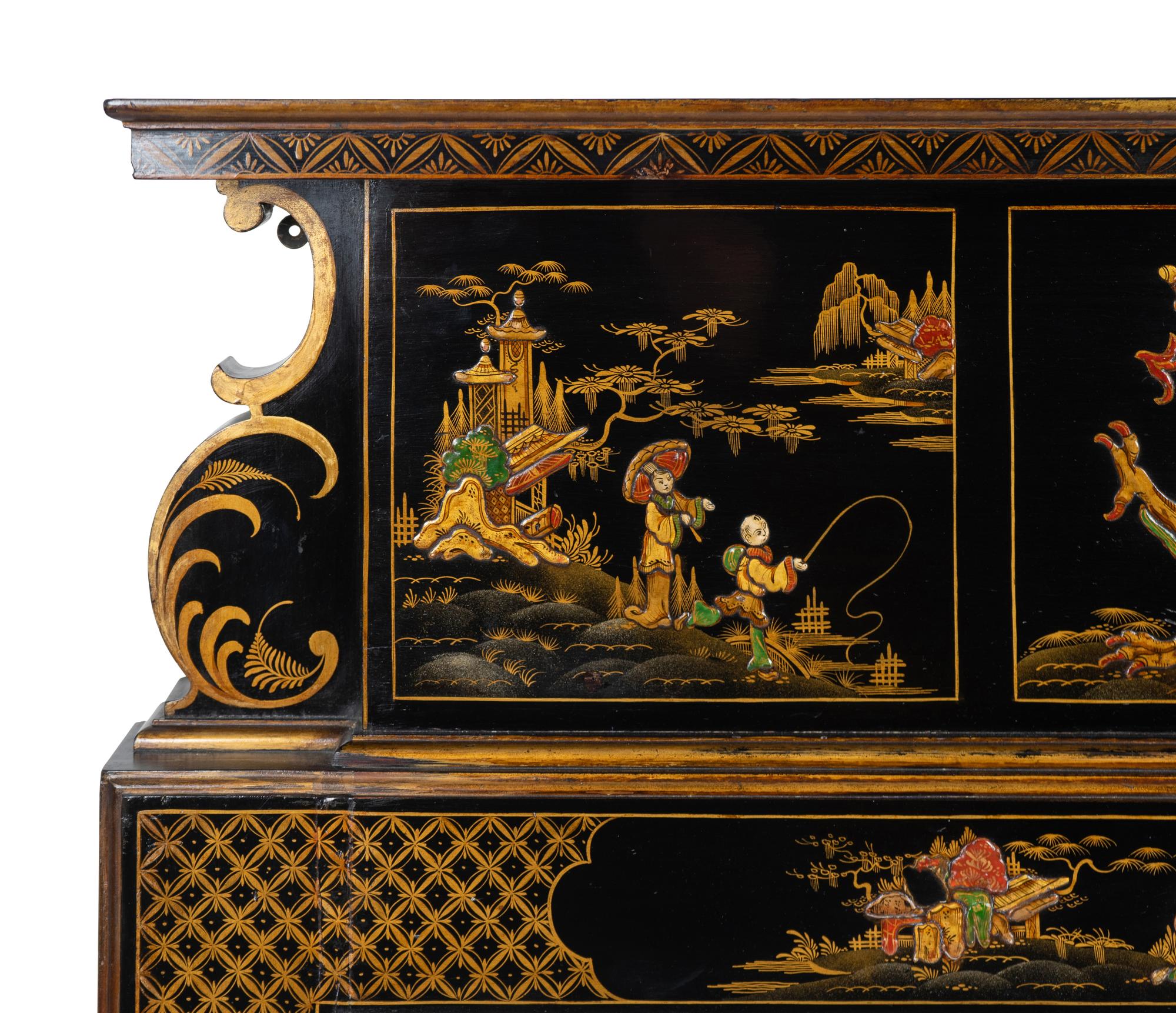An Edwardian Black and Gilt Chinoiserie Decorated Fireplace Surround — EARLY 20TH CENTURY