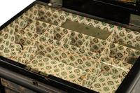 An English Mother-of-Pearl Inlaid Ebonized Cabinet