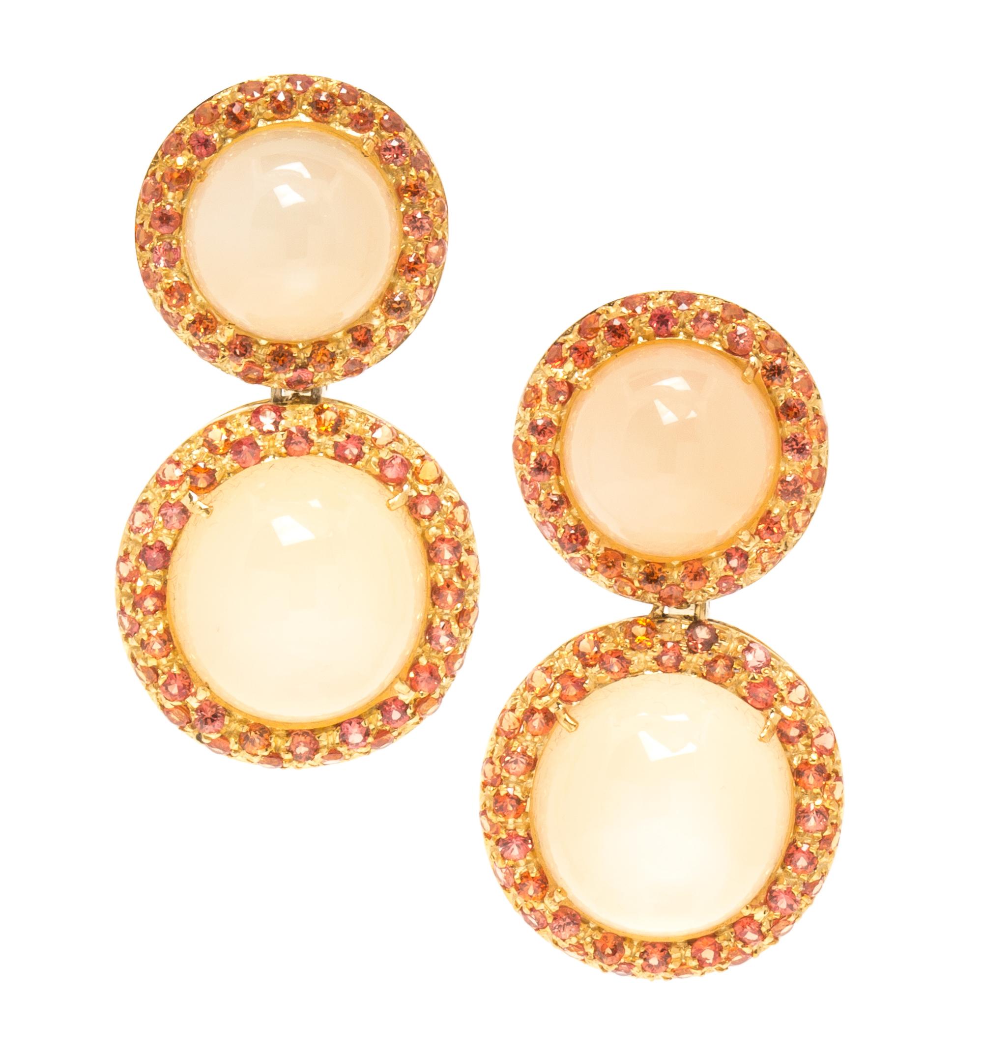 A Pair of 18 Karat Yellow Gold, Moonstone and Sapphire Earclips, 17.90 dwts.