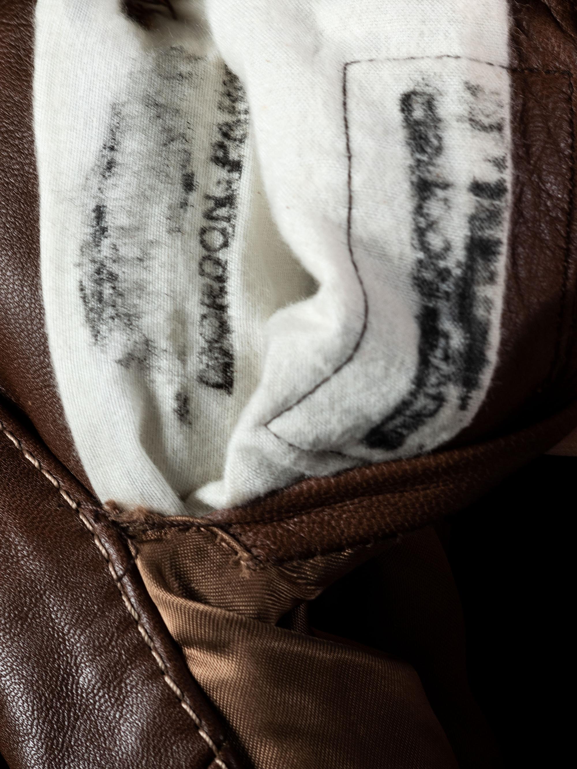 [FILM] -- [PARKS, Gordon (1912-2006)]. Leather overcoat identified to Gordon Parks.
