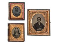 [EARLY PHOTOGRAPHY]. A group of 19 daguerreotypes, ambrotypes, tintypes, and CDVs featuring women, a family, and couples, highlighted by half plate daguerreotype of a young couple.