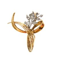 A 14 Karat Gold and Diamond Swirl Pendant/Brooch, 4.70 dwts.