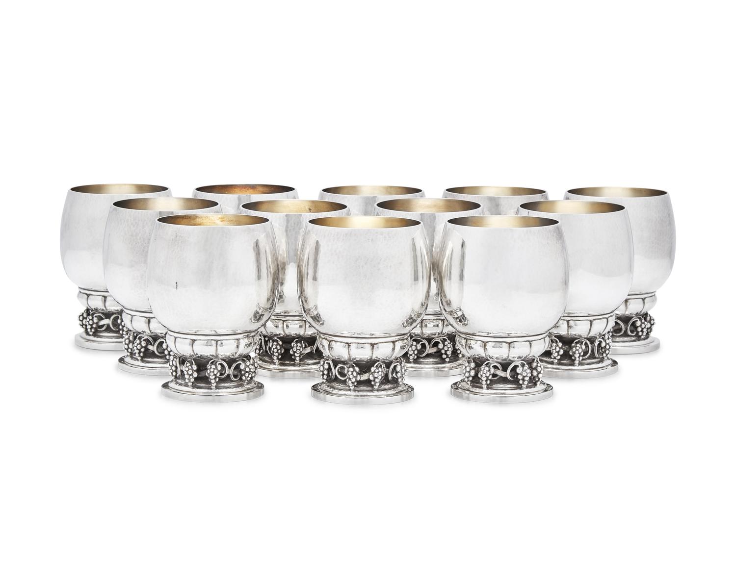 A Set of Twelve Georg Jensen Silver Grapevine Goblets