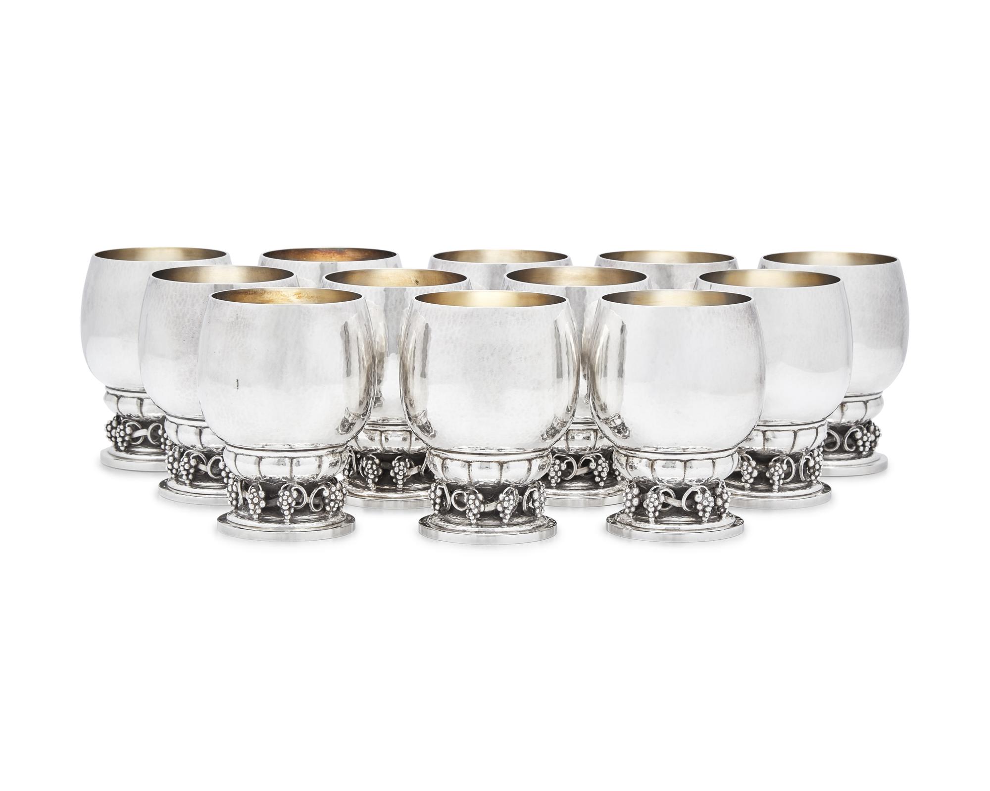A Set of Twelve Georg Jensen Silver Grapevine Goblets