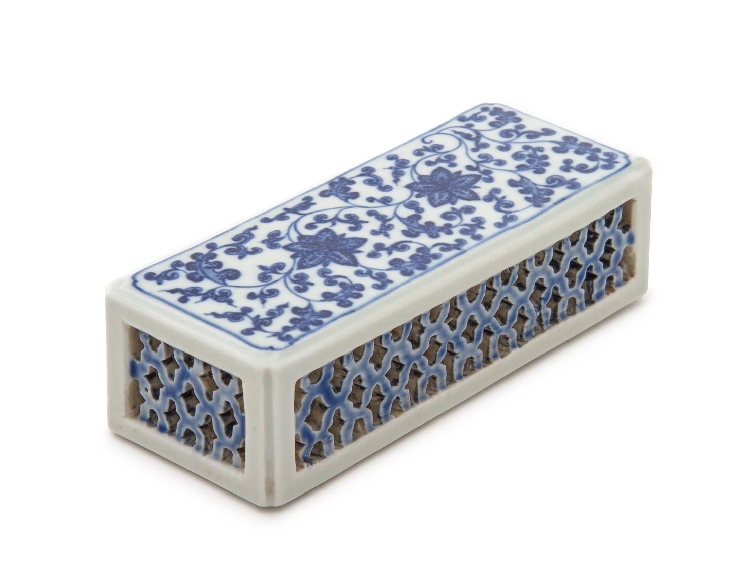A Blue and White Porcelain Paperweight Height 1 3/4 x width 6 1/4 x depth 2 1/2 inches.