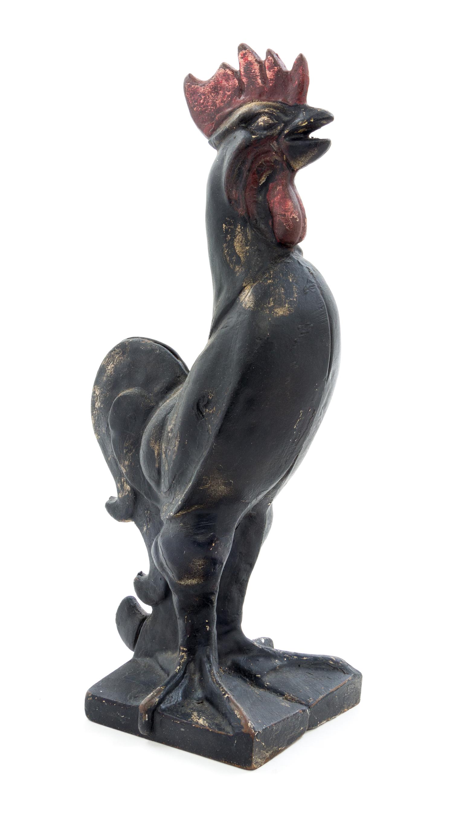 A Cast Iron Doorstop Height 12 inches.