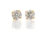 A Pair of 14 Karat Yellow Gold and Diamond Stud Earrings, 0.50 dwts.