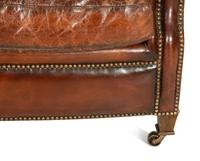 A Pair of Chesterfield Style Leather Club Chairs