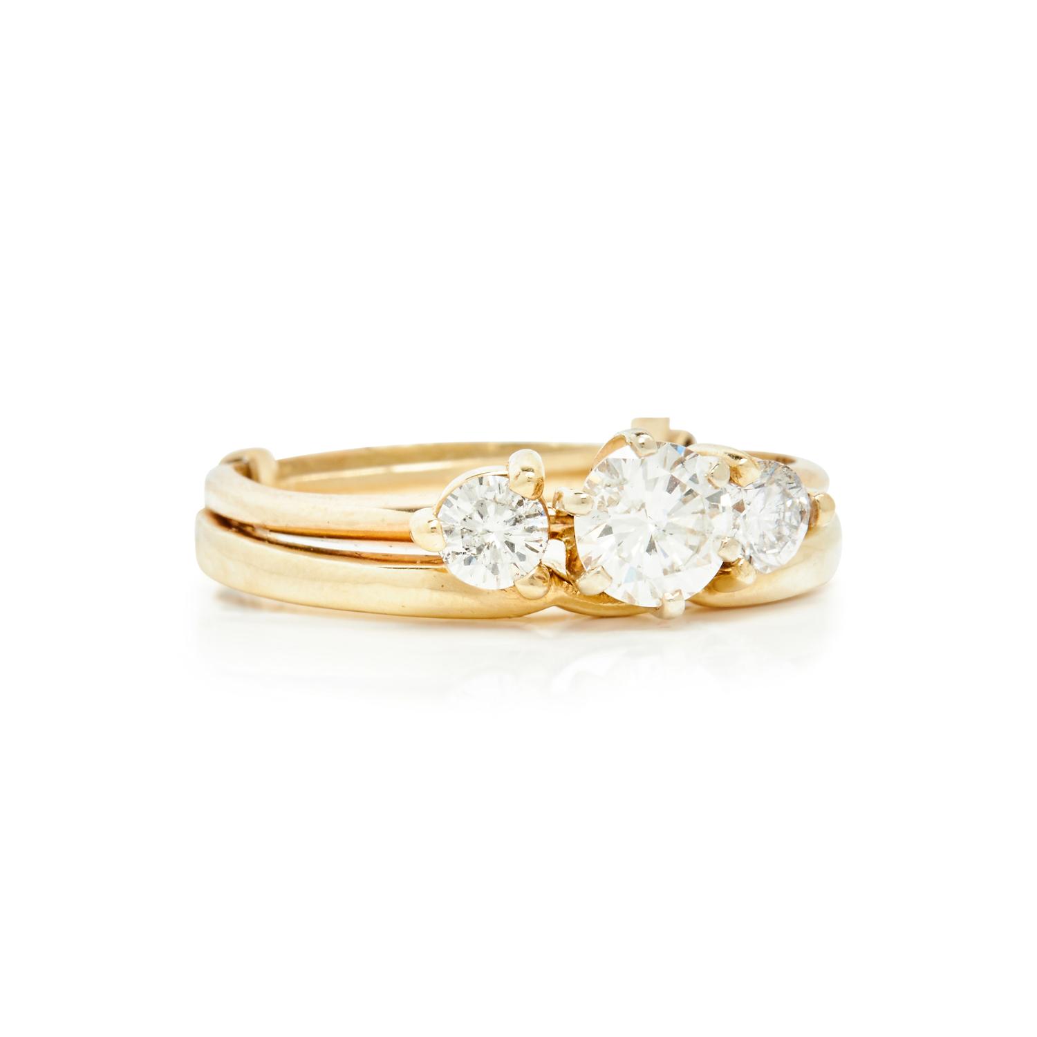 YELLOW GOLD AND DIAMOND THREE STONE RING