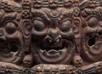 A Nepalese carved and polychromed wood mask 尼泊爾加彩木面具