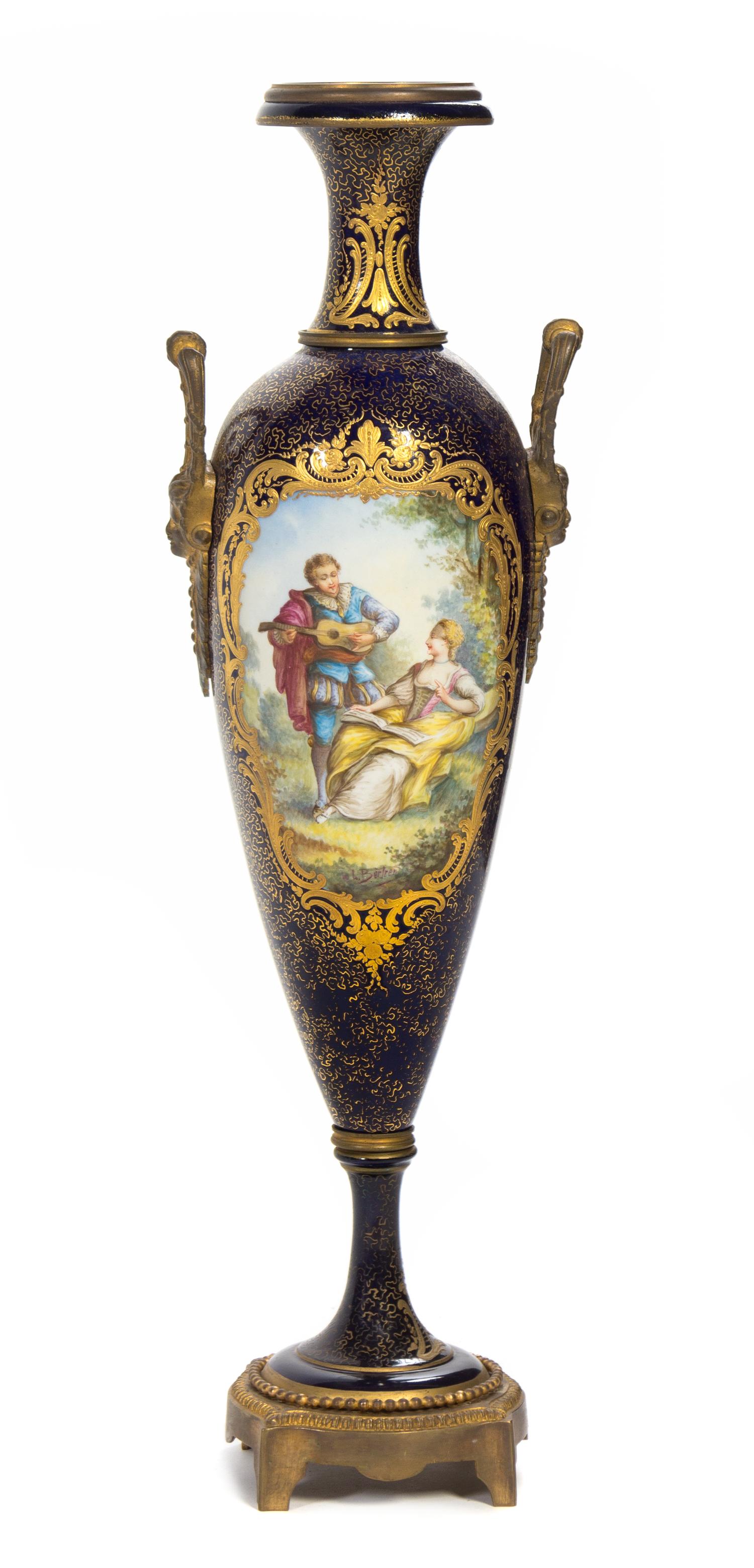A Gilt Bronze Mounted Sevres Style Porcelain Urn Height 23 inches.