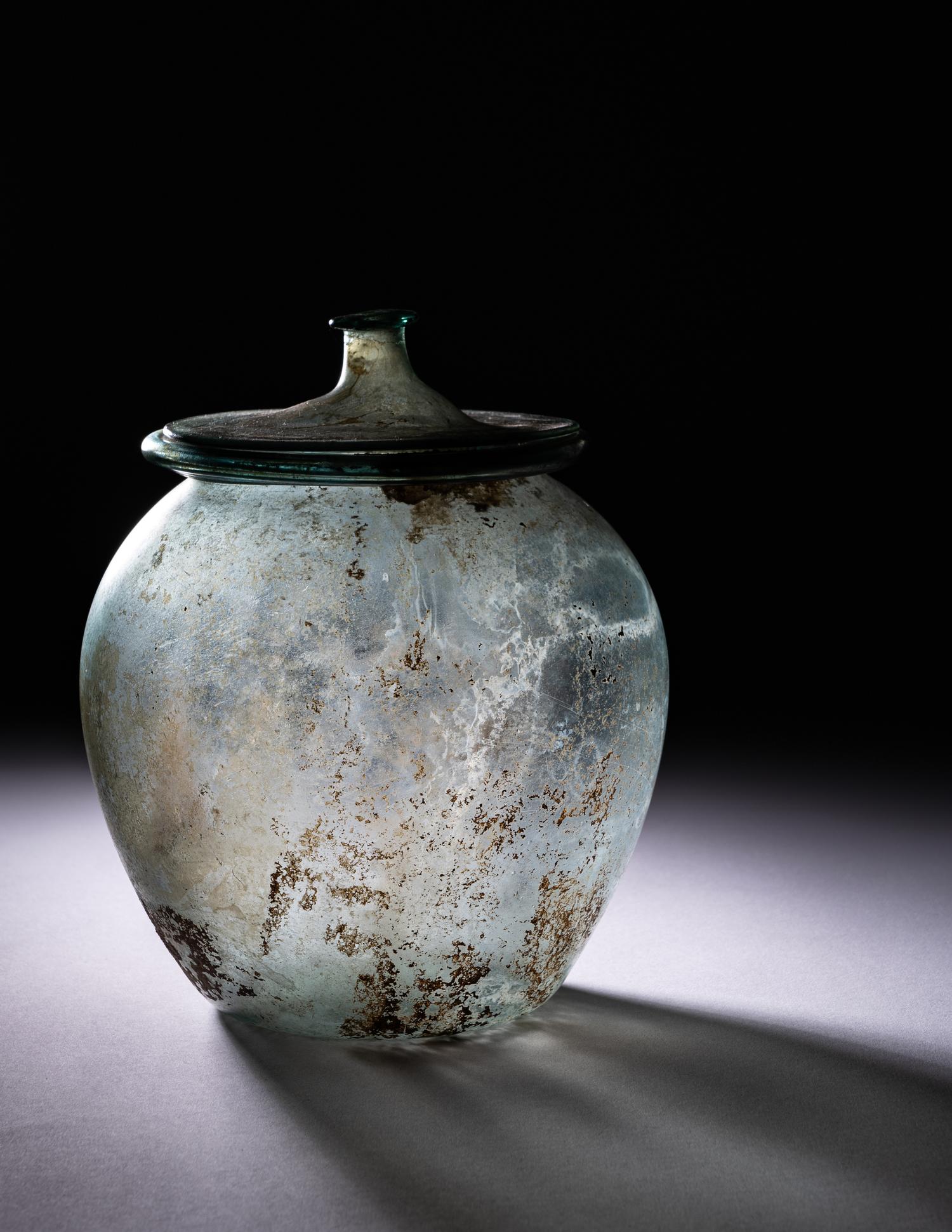 A Roman Blue-Green Glass Cinerary Urn