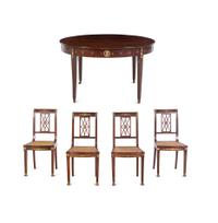An Assembled Empire Style Gilt Metal Mounted Mahogany Dining Suite