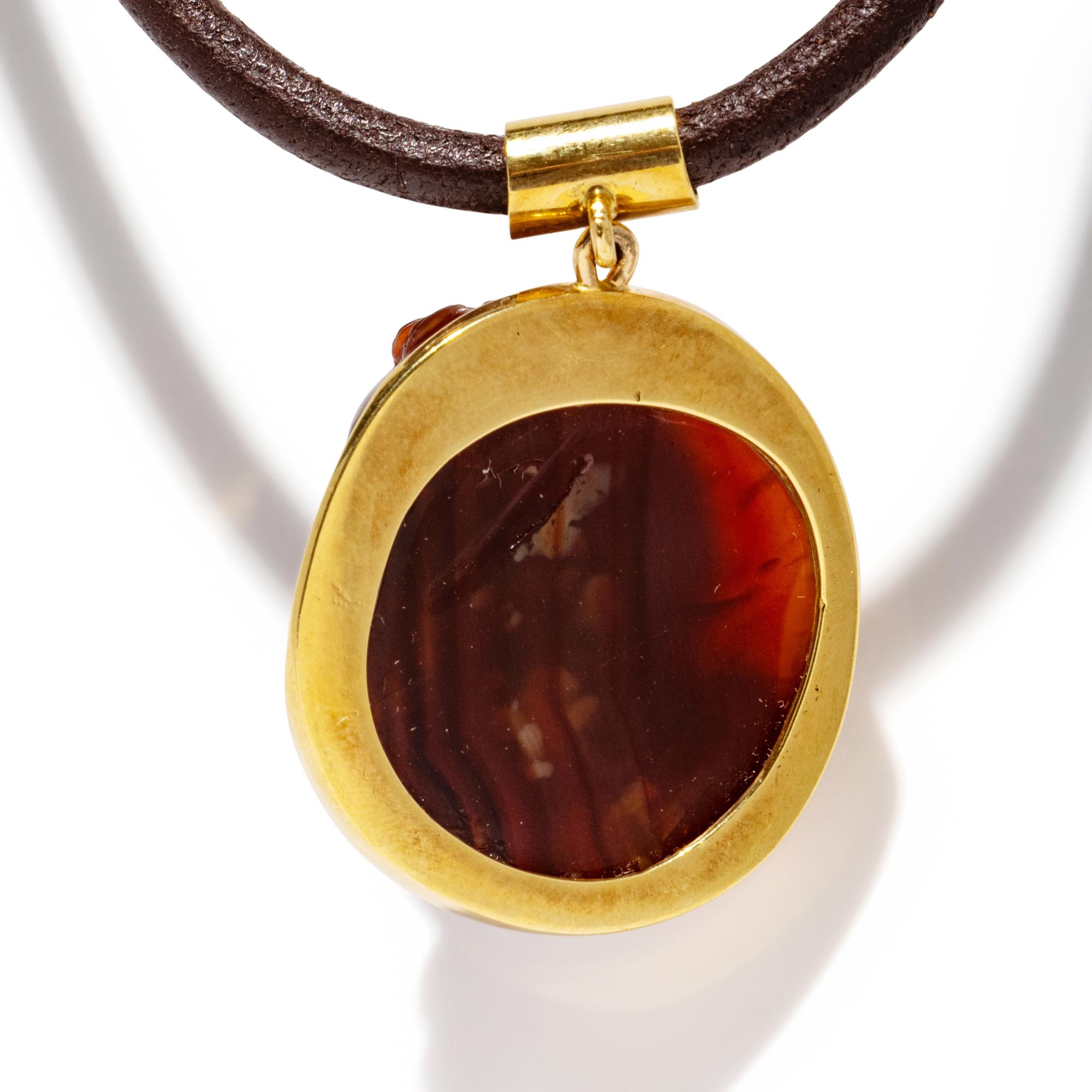 A Roman Carnelian Cameo of a Boy — Set in a gold pendant