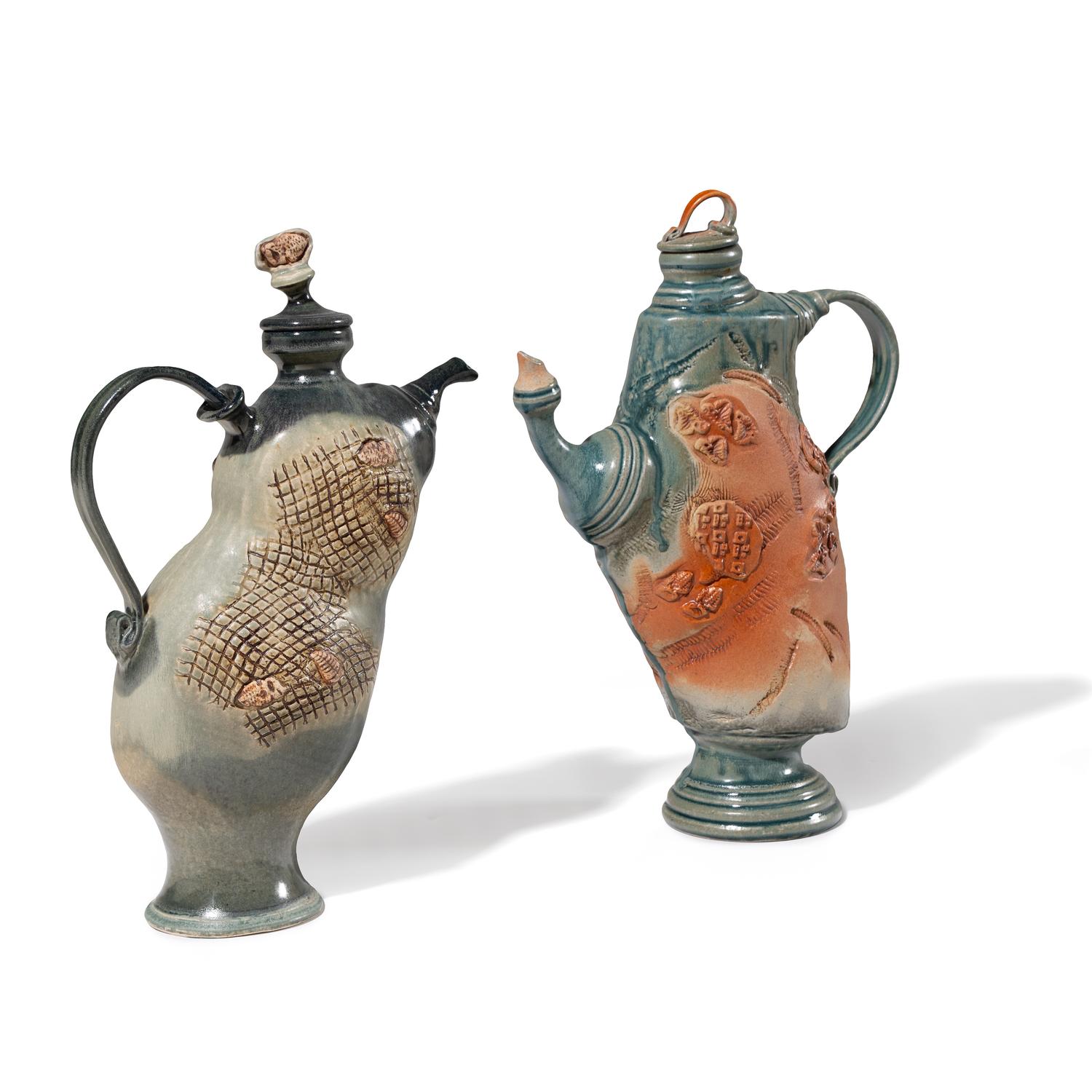 Two Thrown-Altered Teapots