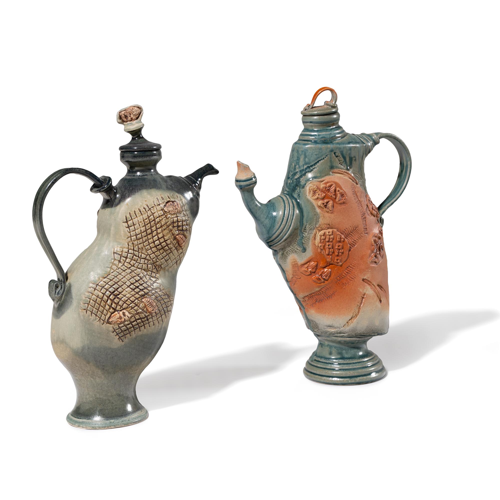 Two Thrown-Altered Teapots